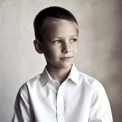 Young boy in white shirt