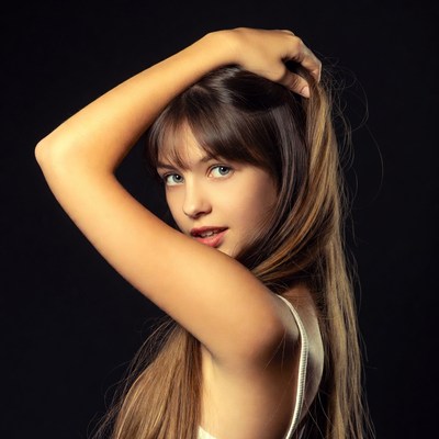 Young woman posing with long hair