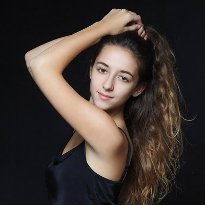 Young woman posing with long hair