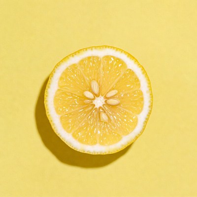 Bright lemon on yellow background