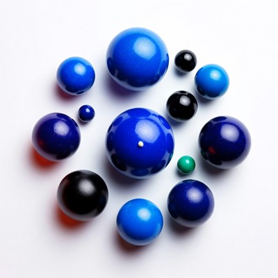 Colorful round objects on white surface