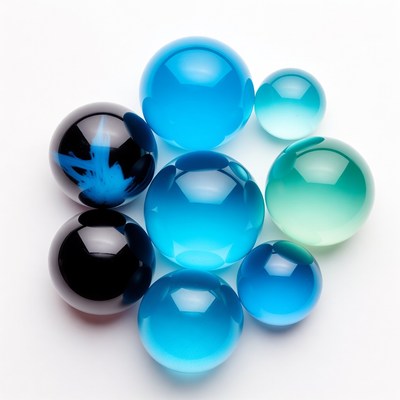 Colorful glass orbs on white background