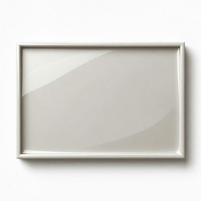 Empty frame on plain wall in bright light