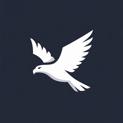 White bird in mid-flight against dark background