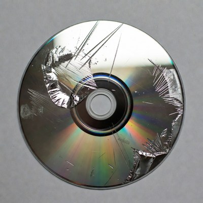 Damaged disc with scratches and cracks