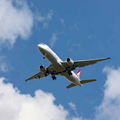 Plane flying in blue sky