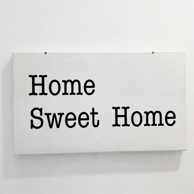 Sign shows home sweet home message