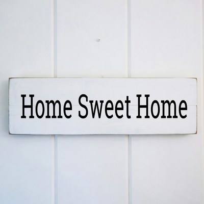 Home sign on wall in indoors