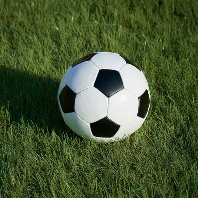 Soccer ball on green grass