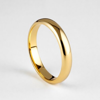 Gold wedding band on white background