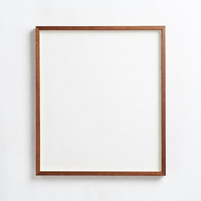 Empty picture frame on white wall