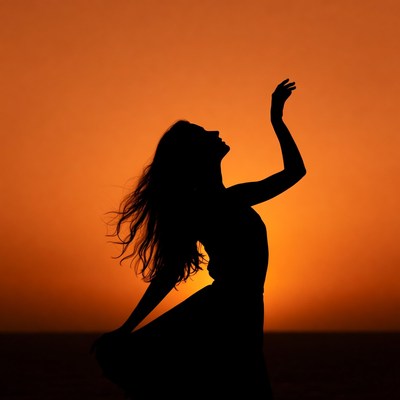 Dancing silhouette at sunset