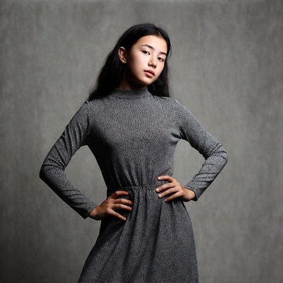 Girl poses in studio setting