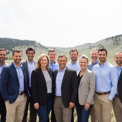 Group of professionals outdoors in mountains