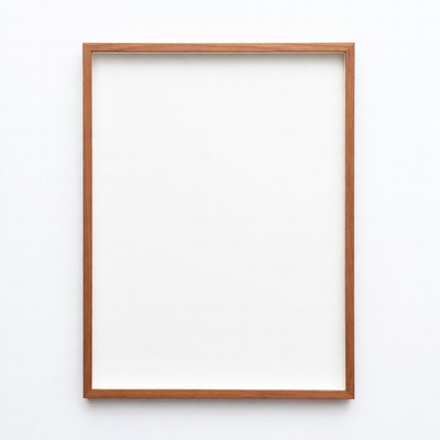 Empty frame on white wall