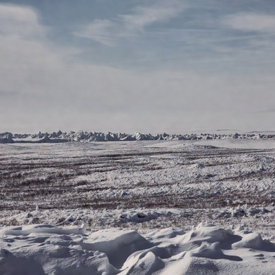 Snowy landscape with ice formations in winter
