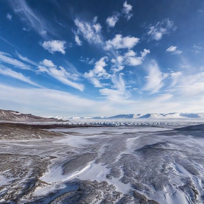 Vast land under a blue sky