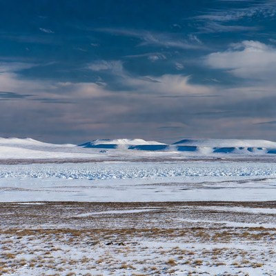 Snowy landscape with blue sky