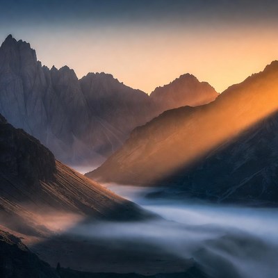Mountain landscape at sunrise over valley