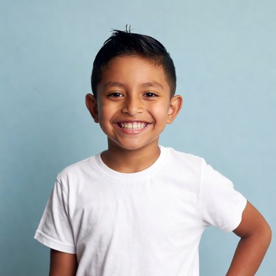 Happy boy with bright smile indoors