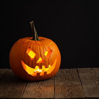 Jack-o'-lantern on wooden table