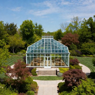 Greenhouse in a garden setting