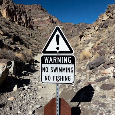 Warning sign in desert area