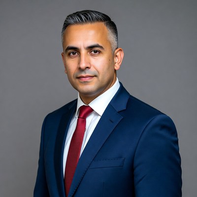 Professional man in suit posing indoors