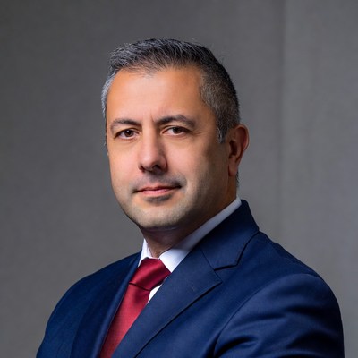 Professional man in suit poses for portrait