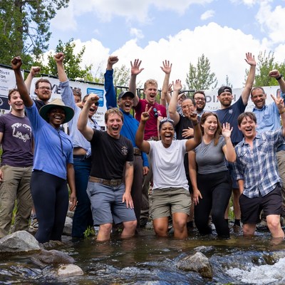 Group celebration by the river