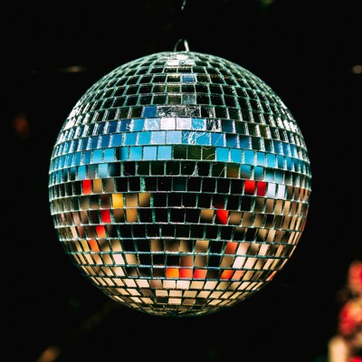 Mirror ball hanging in a dark setting