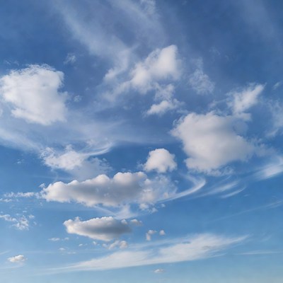 Clouds in a clear blue sky