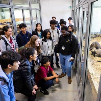 Students learn about otters at a center