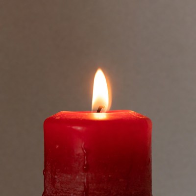 Candle flame in dim light setting