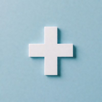 White plus symbol on blue background