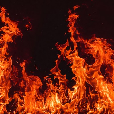 Flames dance in dark background