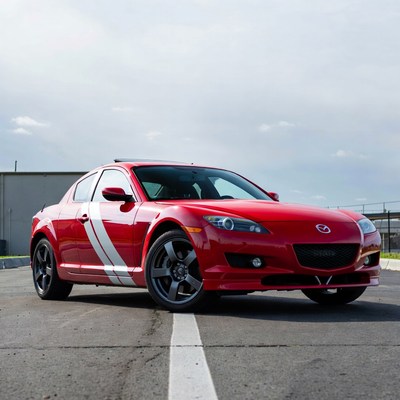 Red car parked on a street