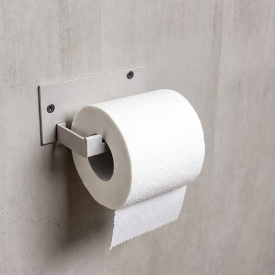 Toilet paper roll on wall holder