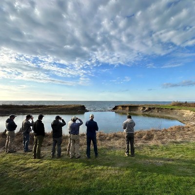 People look at water body