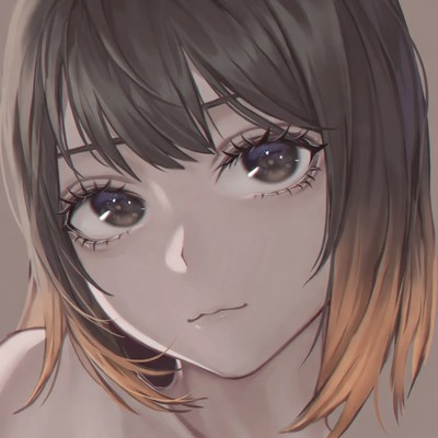 Young woman with brown hair and orange tips