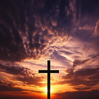 Silhouette of cross at sunset