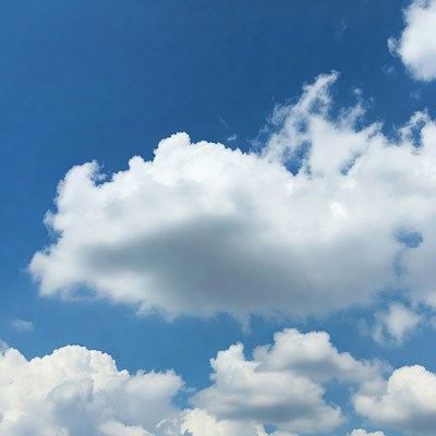 Bright clouds in blue sky