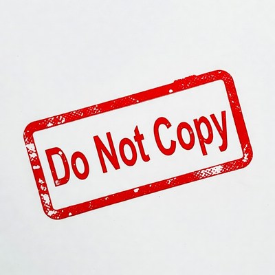 Red stamp with a warning against copying