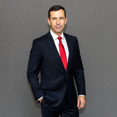 Businessman in suit poses for portrait