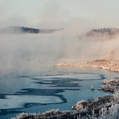 Frosty river landscape at dawn
