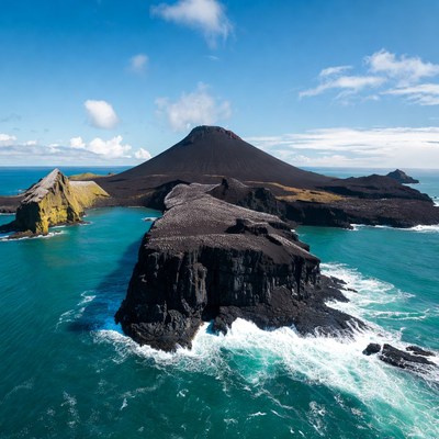 Volcanic island near blue water