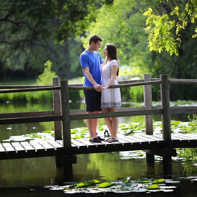 Couple on bridge at lake