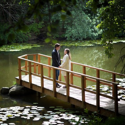 Couple on bridge by the water