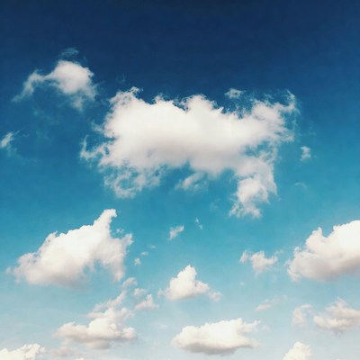 Clouds in clear blue sky