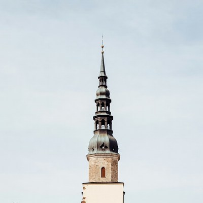 Historic tower rises against sky
